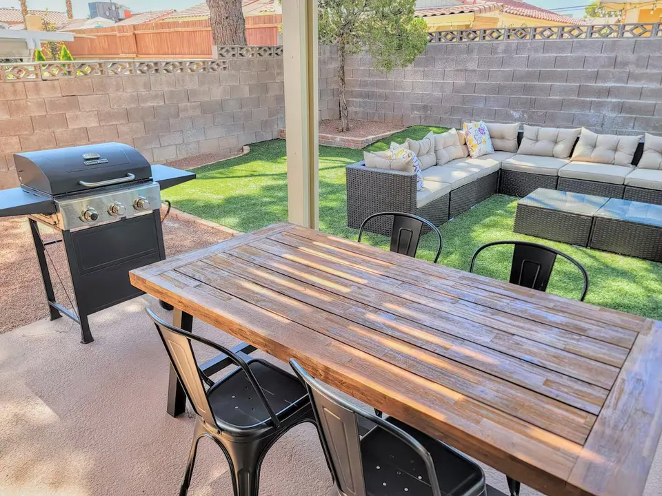 Outdoor dining table and BBQ grill