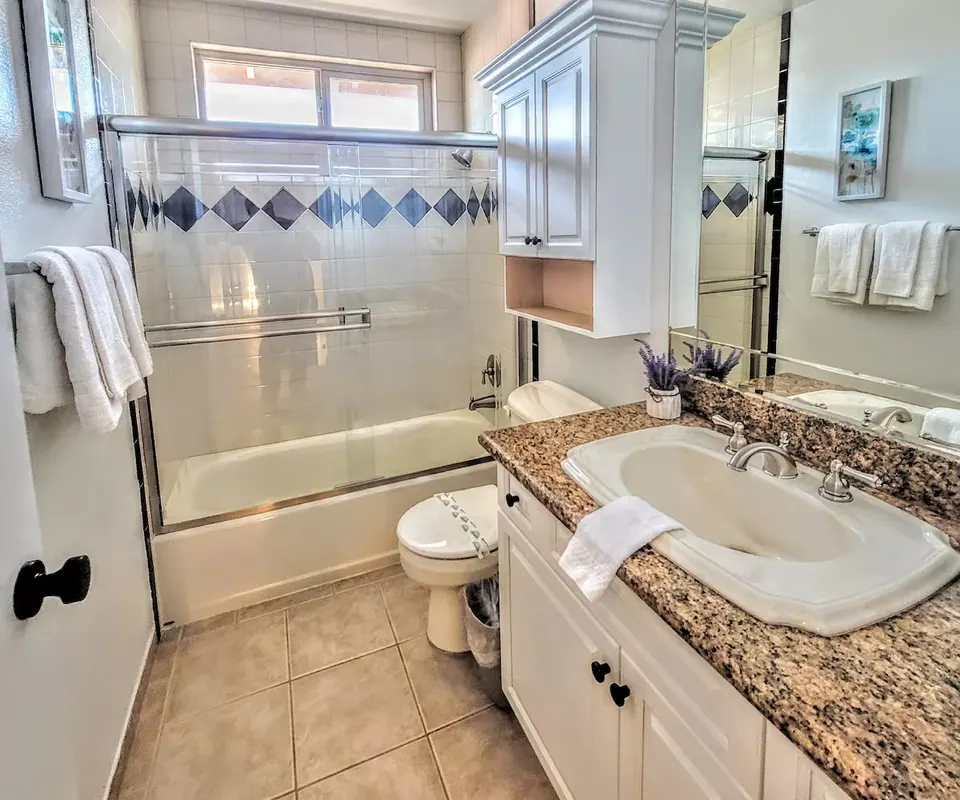 Bathroom with tub and shower