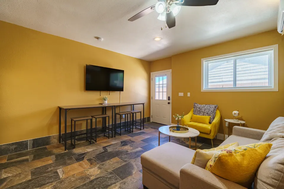 Casita lounge with bar seating and TV
