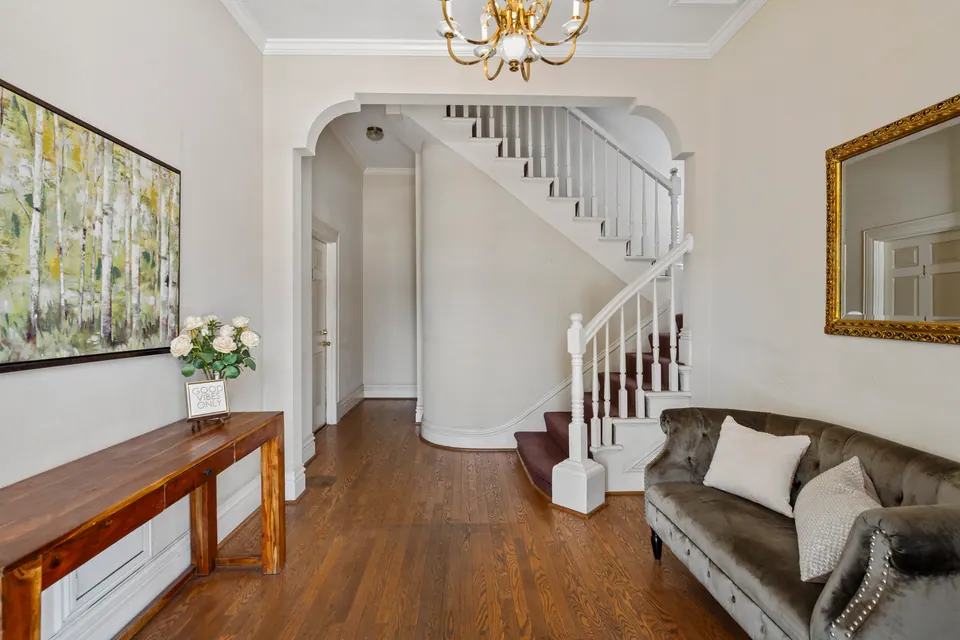 Shared foyer with curved staircase